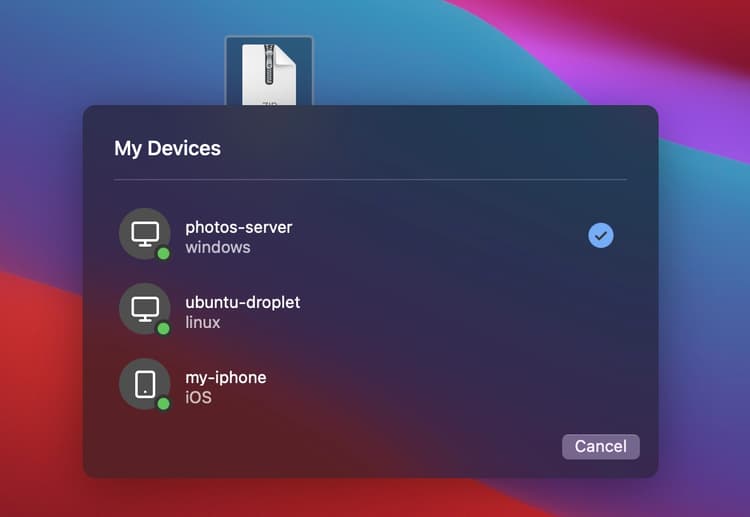 The modal window with a list of devices. The selected device has a checkmark to indicate the transfer is complete.
