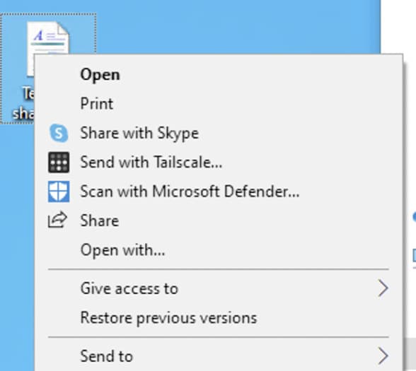 A Windows desktop with a file's context menu open. The 'Send with Tailscale...' option is listed.